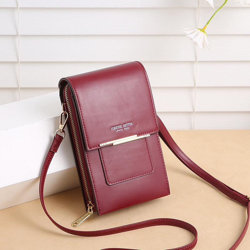 Crossbody mobile phone bag by Try Modest