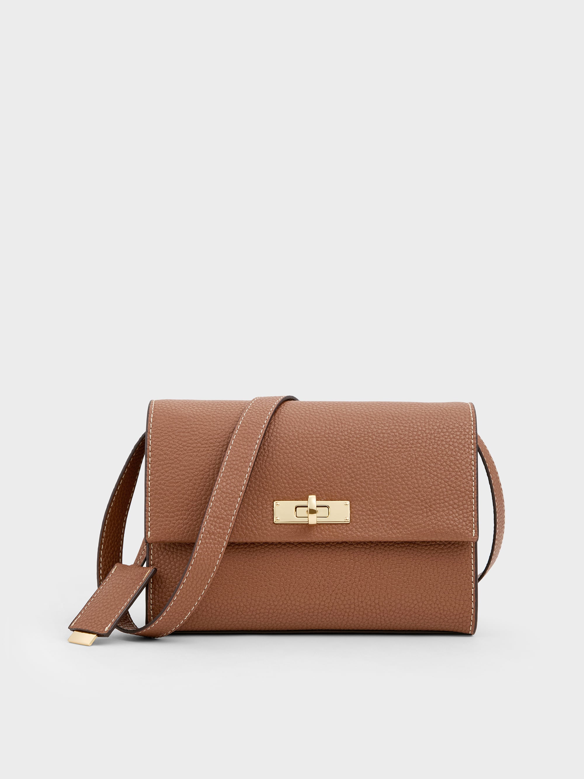 CHARLES & KEITH - Chance Turn-Lock Crossbody Bag by Charles & Keith US