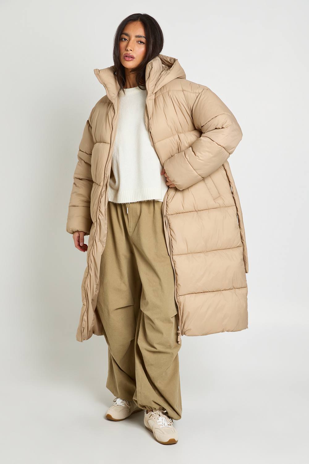 boohoo Women's Hooded Belted Longline Puffer Jacket in Taupe by boohoo