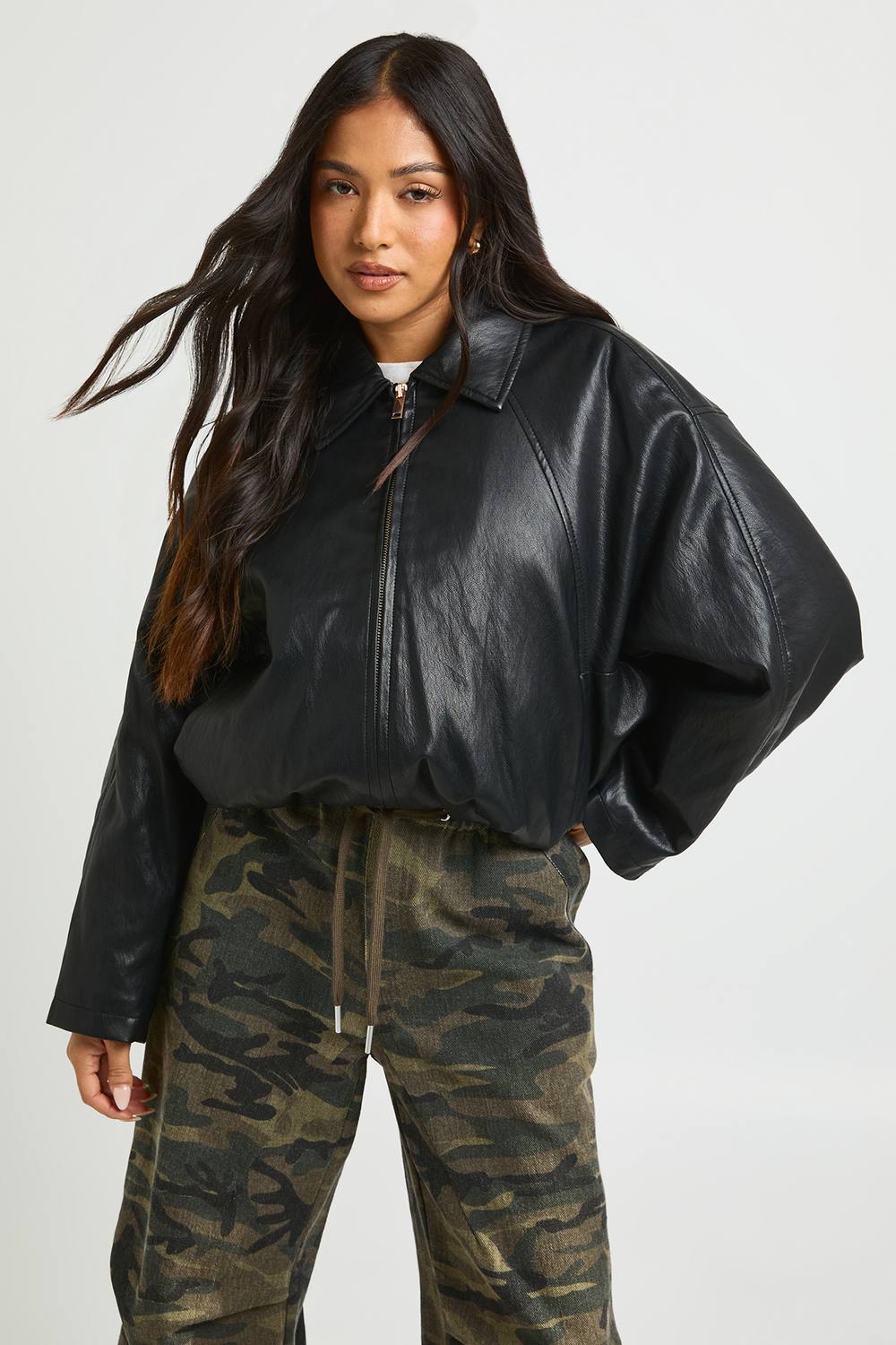 boohoo Women's Petite Faux Leather Padded Bomber Jacket in Black by boohoo