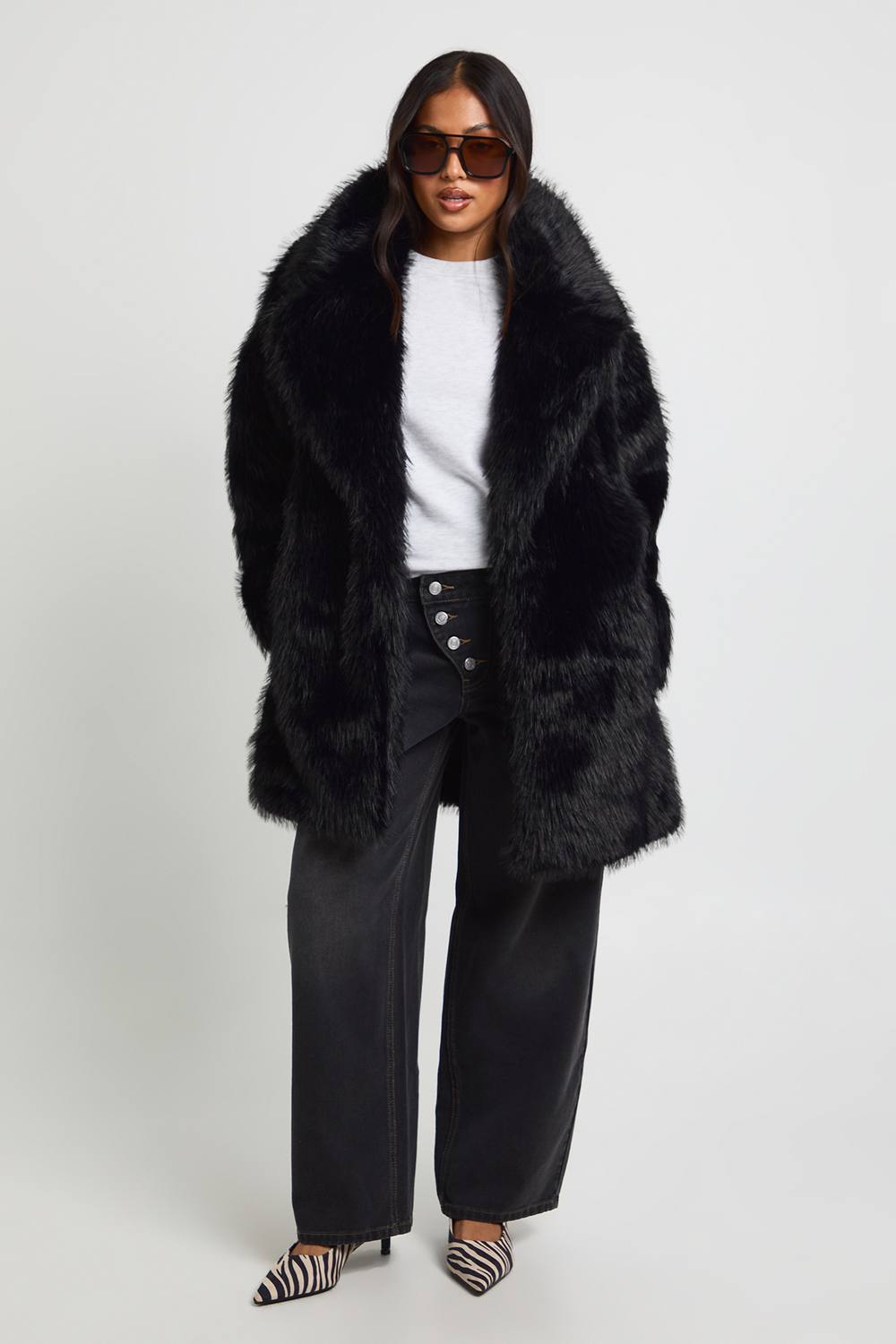 boohoo Women's Petite Longline Vintage Look Faux Fur Coat in Black by boohoo