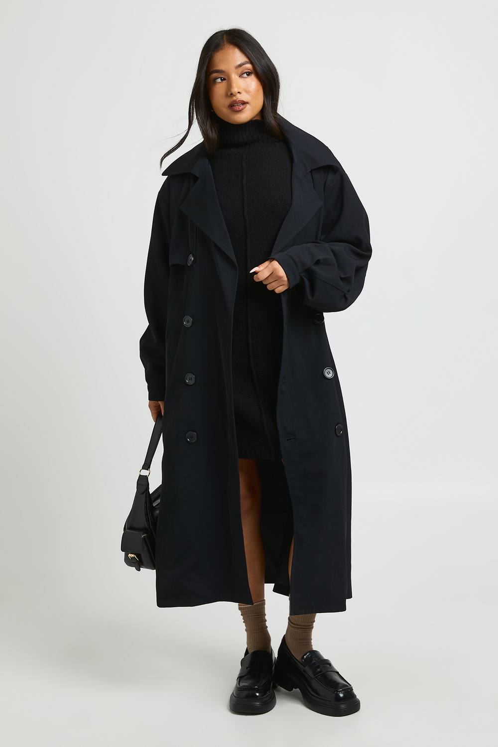 boohoo Women's Petite Oversized Raglan Sleeve Trench Coat in Black by boohoo