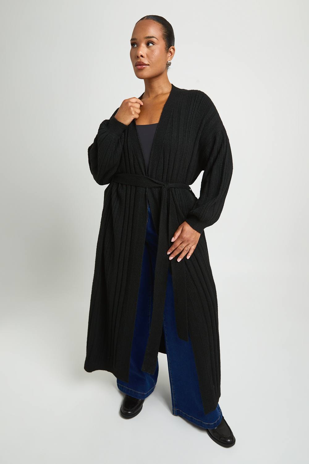 boohoo Women's Plus Belted Mixed Rib Soft Knit Maxi Cardigan in Black by boohoo