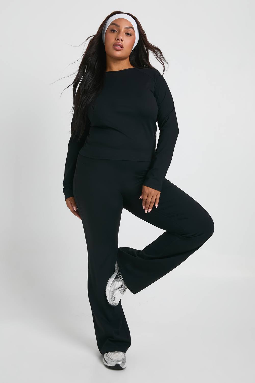 boohoo Women's Plus Super Soft High Waist Flared Legging Pants in Black by boohoo