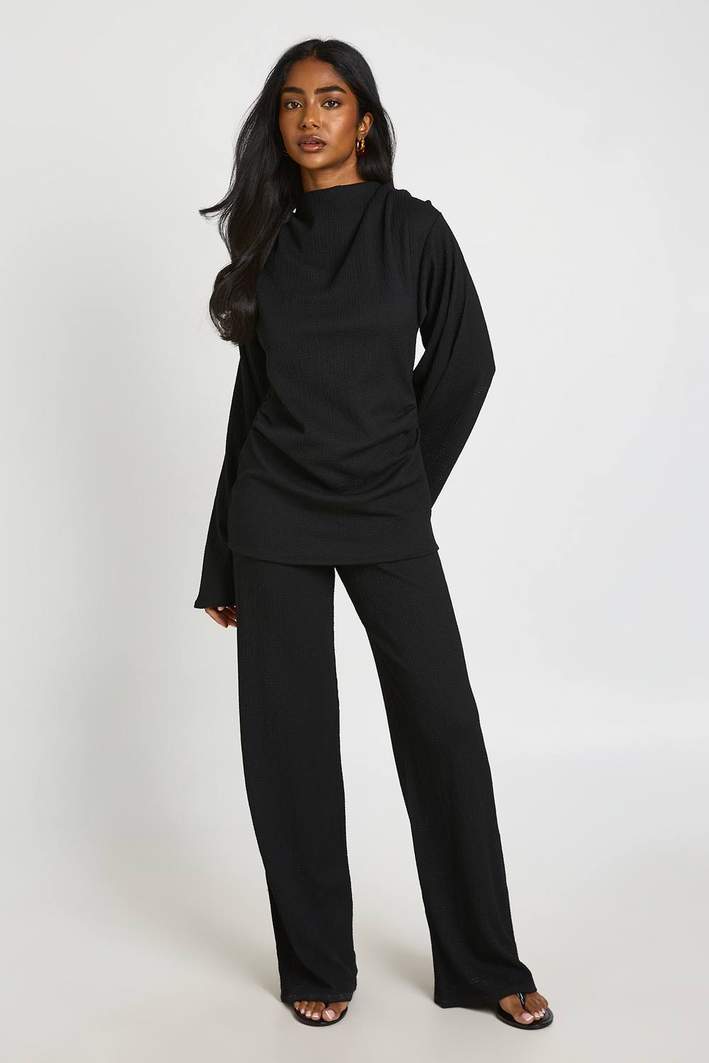 boohoo Women's Textured Slash Neck Cinched Waist Jumpsuit in Black by boohoo