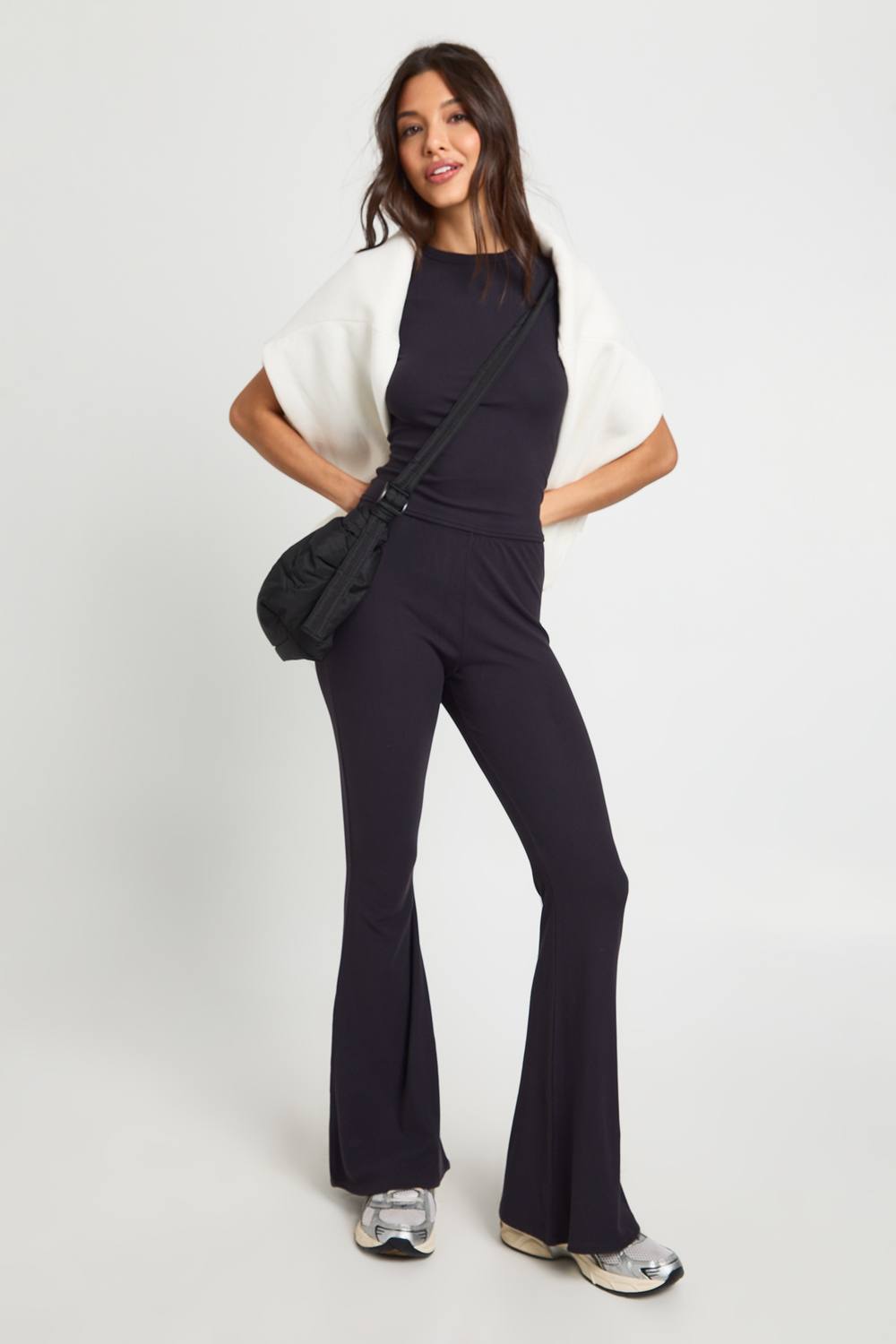 boohoo Women's Ultra Soft Flared Legging Pants in Black by boohoo