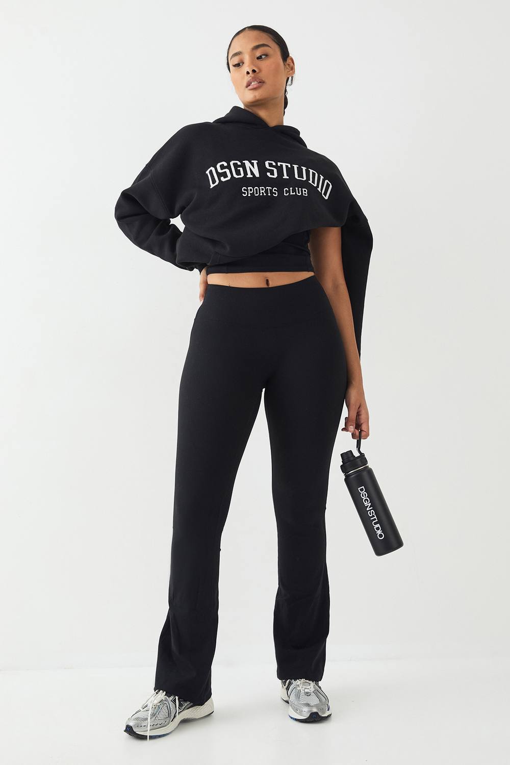 DSGN Studio Women's Petite High Waist Sculpt Yoga Flared Legging Pants in Black by boohoo