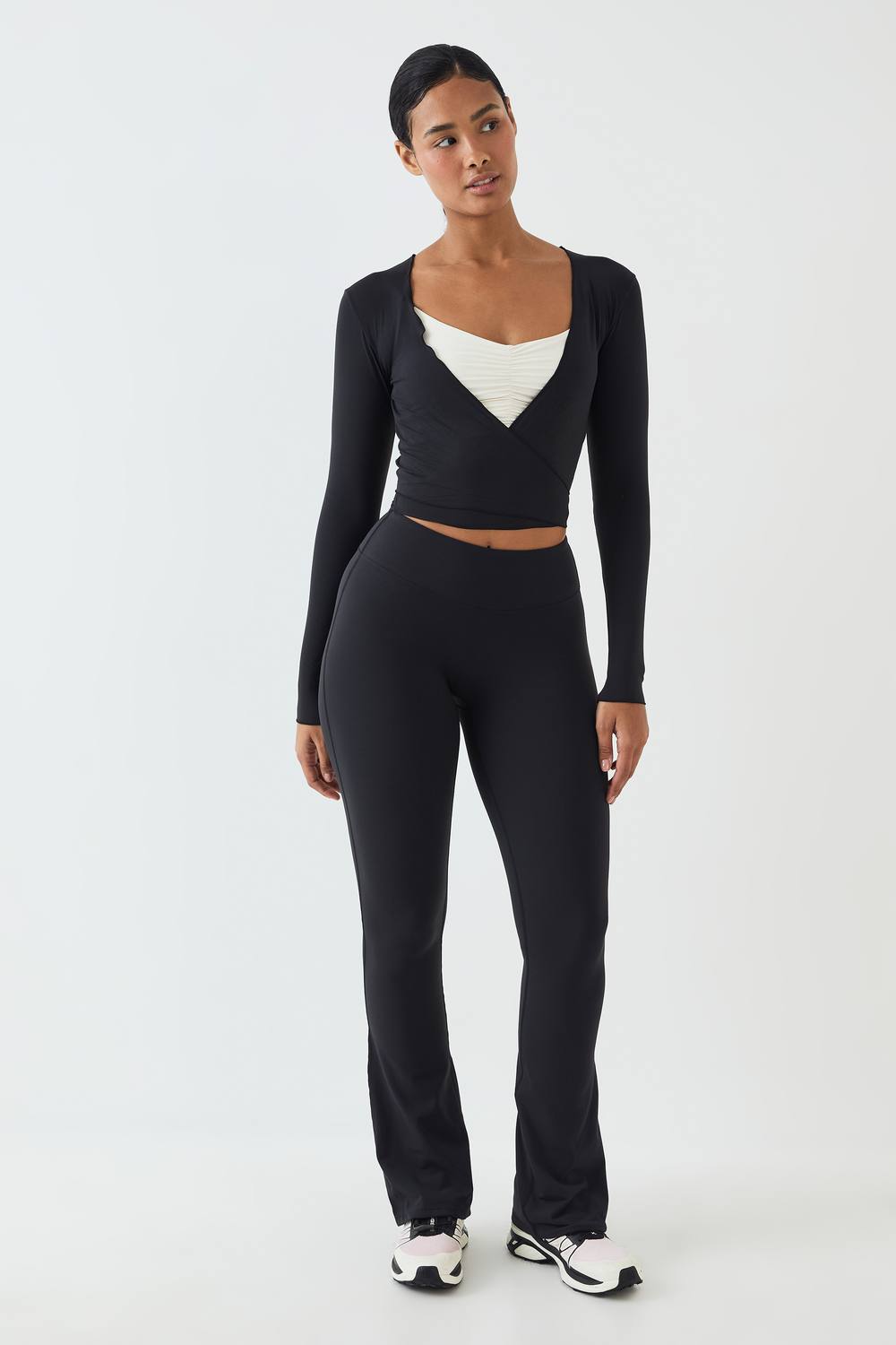 DSGN Studio Women's Petite Soft Luxe Mid Waist Flared Legging Pants in Washed Black by boohoo