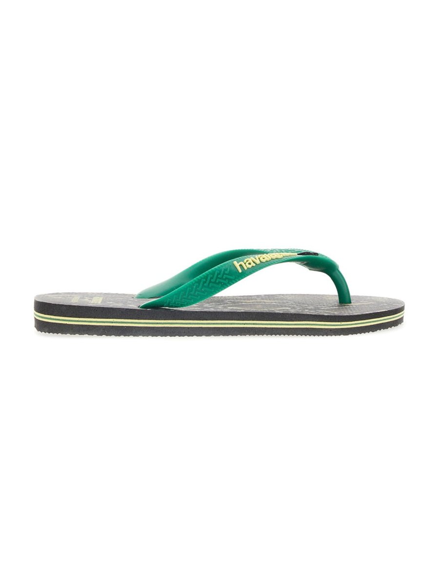 Rotate Birger Christensen Rubber Flip-Flop Sandals — Black by Rotate Birger Christensen